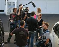 Camera crew filming a scene